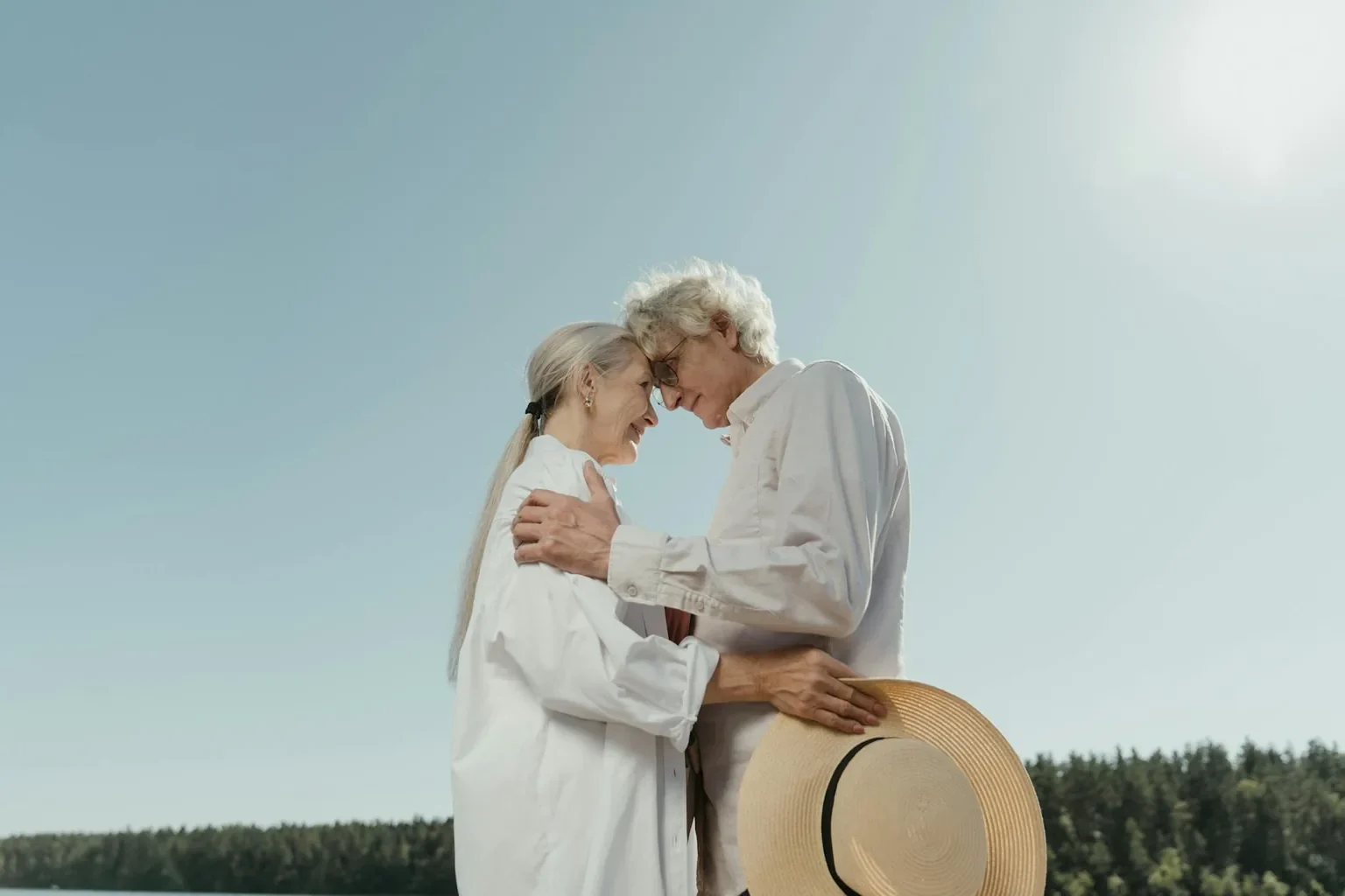Happy senior couple enjoying clear outdoor vision after cataract surgery.