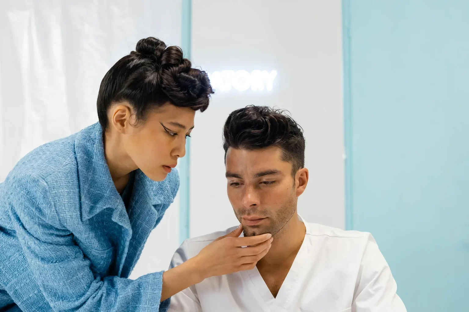 A medical professional examining a patient in a clinic, focusing on health assessment.